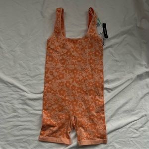 NWT never worn forever 21 orange smiley face onsie romper unitard